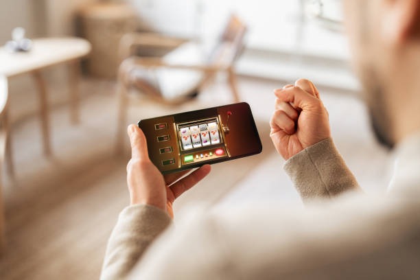 gengtoto com app running on mobile phone with low-data mode active